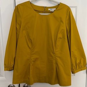 Boden mustard top with darts and sash. US 12. Band cuffs with buttons.